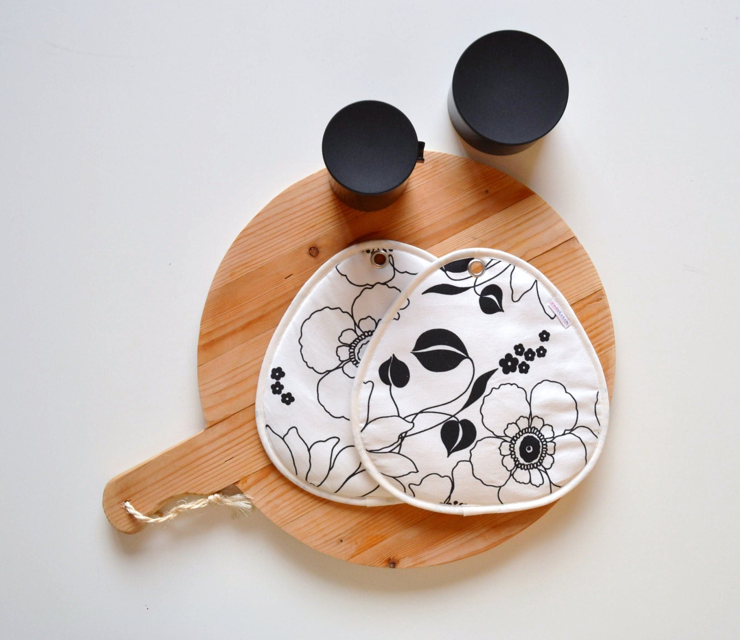 black and white potholders with floral print modern kitchen