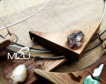 Pendant in walnut and mixed oxidized iron-quartzite created and finished by hand
