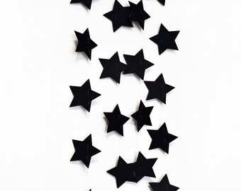 Black stars garland in cardboard
