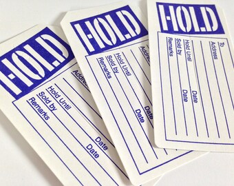 Hold merchandise tags with slits