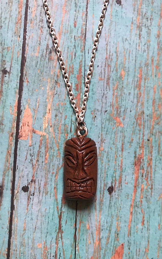 Items similar to tiki face necklace charm, Hawaiian necklace, tiki head