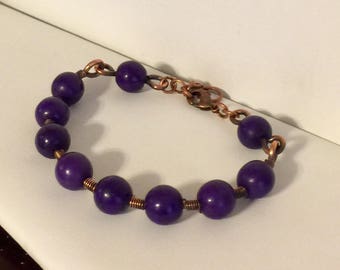 Wire wrapped purple bead bracelet
