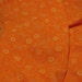 bright orange thick stretch cotton with embossed yellow daisies large remnant UK seller