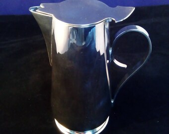 19th century silver plate hot water jug.