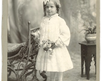 Beautiful cabinet Card of a little girl holding flowers