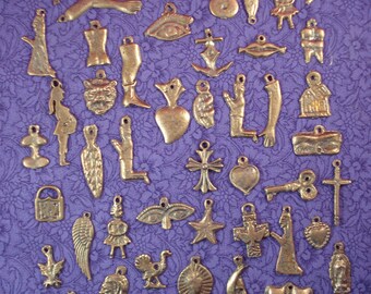 MIlagros 100 Assorted Antiqued Gold Tone Mexican Milagros Charms Ex Votos Offerings Wholesale