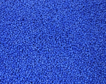 10 oz of 2 mm dark blue seed beads
