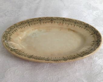 Knowles Taylor & Knowles cream colored oval dish