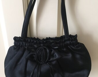 Elegant evening bag with JIL SANDER