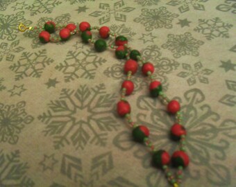 Bracelet made of beads and polymer clay pink and khaki