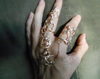 Gold or silver tone knuckle ring