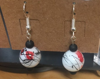 Red and black splatter earrings