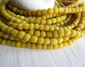 Yelllow glass seed bead, matte barrel tube, small rustic ethnic spacer , indonesian 3 to 6mm, new indo-pacific (22 inches)7ab29-4