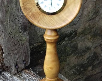 Laurel- burr mantle clock.