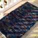 Hand-woven chenille Pendleton wool selvage rug