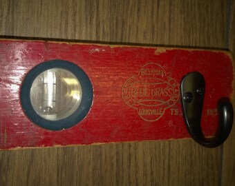 Vintage Blue Grass level from Louisville repurposed into a coat rack.