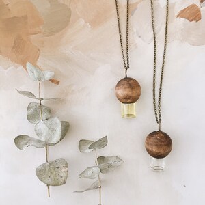 The original wood and glass essential oil rollerball necklace