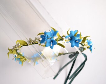 A rim with blue bell flower is done from фоамирана