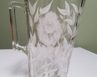 Glass Pitcher with White Flowers