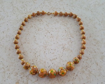 Vintage 1970's wood bead necklace with yellow painted flowers