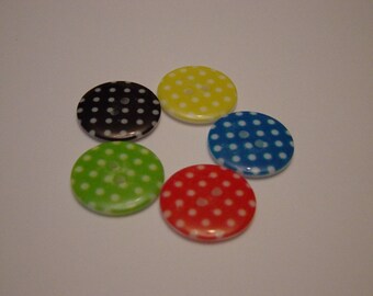 Five buttons with white polka dots