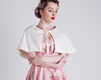50s inspired ivory occasion / bridal capelet, with a lace peter pan collar and floral pastel lining. Made to order