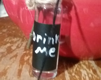 Drink me bottle and key necklace