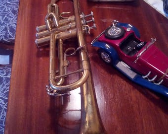 Old trumpet instrument -Trumpet instrument -Trumpet for interior -Brass with copper features -Original instrument -Retro trumpet