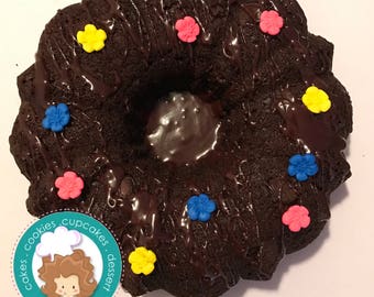 moist Chocolate Bundt Cake with fondant decorations