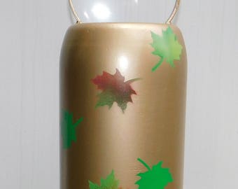 Tank bell wind chime or gong with falling leaves