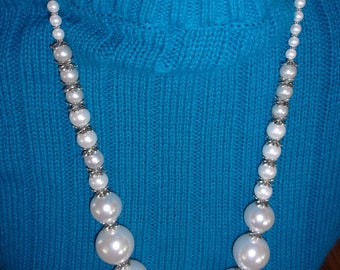 Simulated pearls with silver jackets