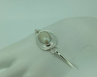 Sterling Silver Lady's Cabachon White Moonstone Hinged Bangle