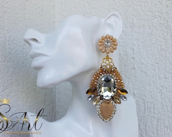 Handmade earrings in beige