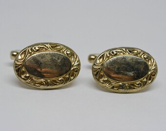 Gold tone cuff links