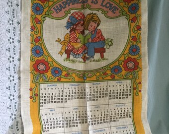 Five country-style 1980s linen tea towels