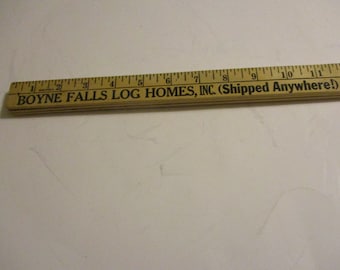 Vintage 1970's wooden yardstick with advertising on it. Advertising from Boyne Falls Mich.