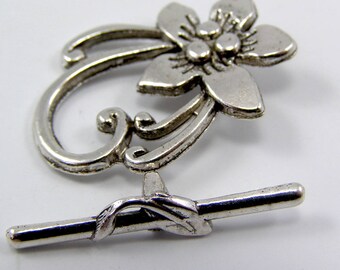 Set of 2 toggles 28 x 20 mm stem 30 mm silver color clasps