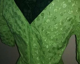 Vintage 1960s green dress, silky thin material.