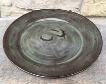 Large Pottery Serving Platter or Charger Plate on dark clay