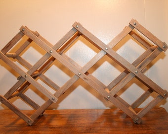 Expandable Wine Rack,wine rack,folding wine rack,wine bottle rack,wine rack floor,wine rack wood,wine rack shelf,wine rack standing,wine