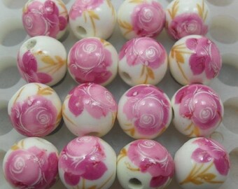 2 CERAMIC FLOWER BEADS PINK 12 MM.