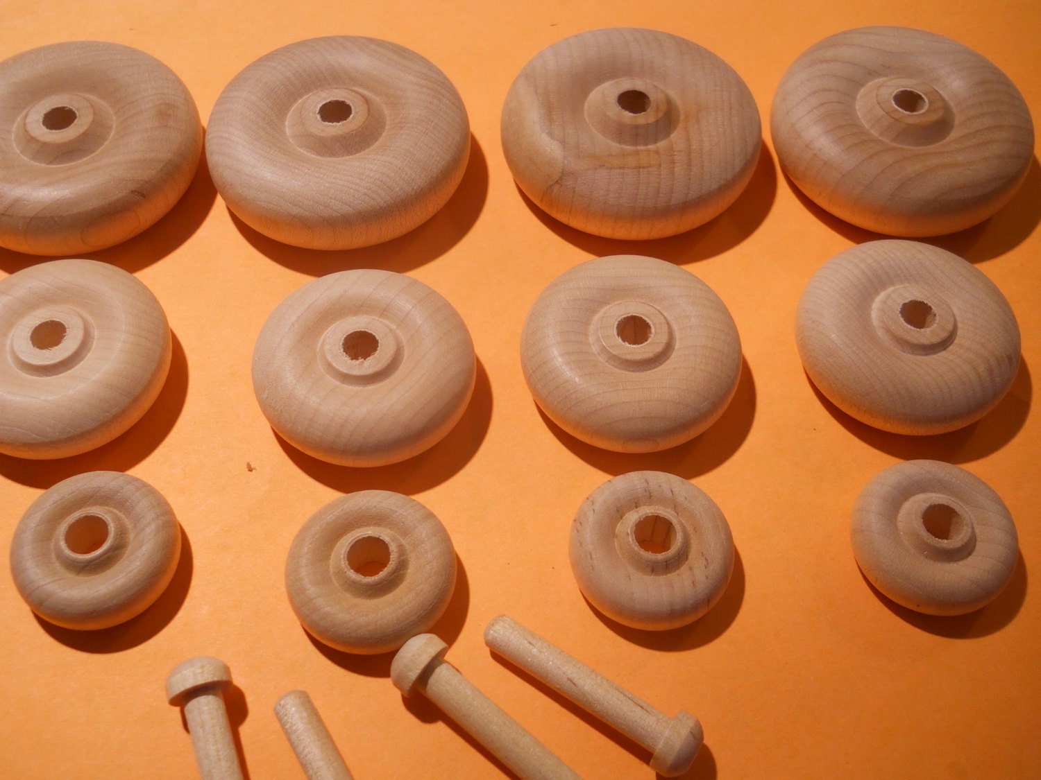 Four Wooden Toy Wheels and Axles