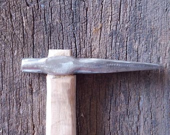 Blacksmith hammer eye punch. Handmade forged hammer eye