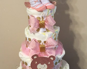 Pink and Gold Diaper Cake with a hidden bonus hidden inside diaper cake