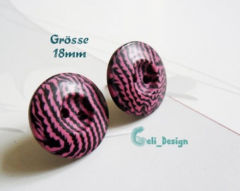 Ear plug button marks magenta black