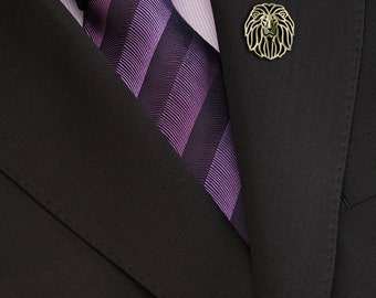 Lion brooch - gold.