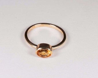 1.9 Gram. 14K Yellow Gold Orange Sapphire Ring, size 6.5