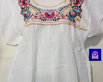 M-L Mexican blouse hand embroidered.