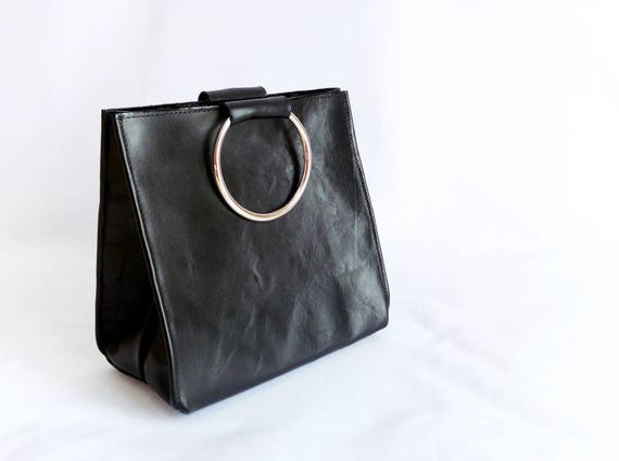 small black handle bag