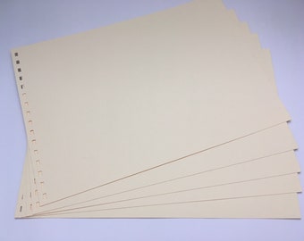 Extra pre punched card sheets for A4 scrapbooks sold by The Craft Bus